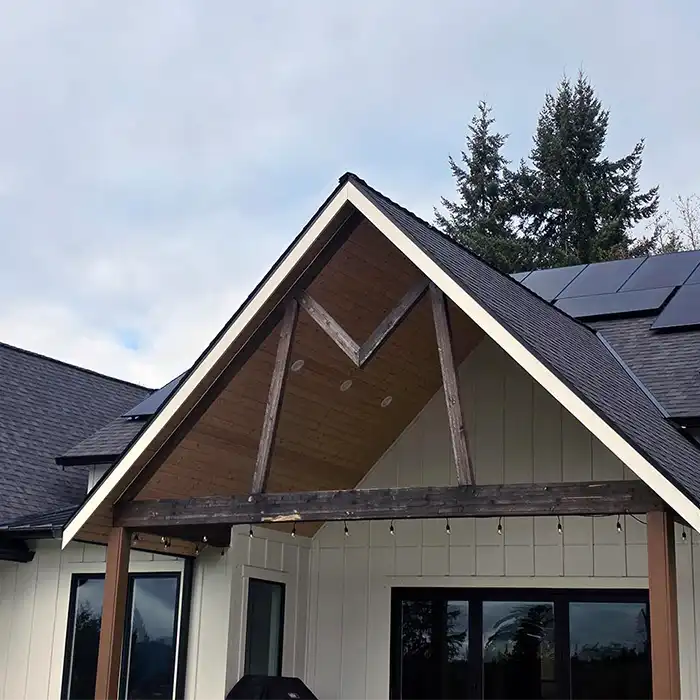 eave of roof on residential home near trees